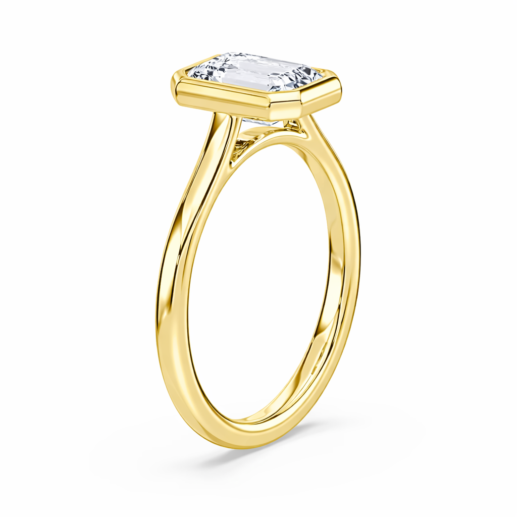 14K Emerald Solitaire — Bezel Set
