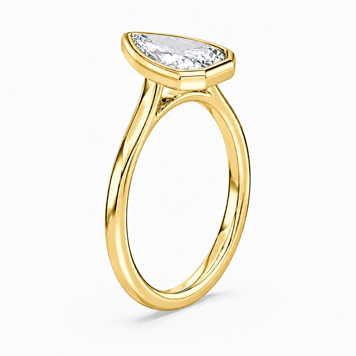14K Pear Solitaire — Bezel Set