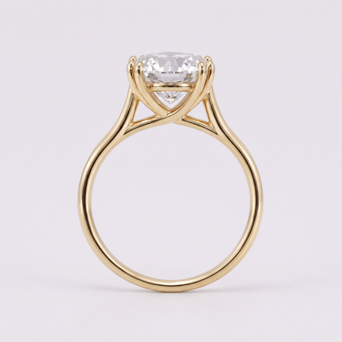 14K Round Solitaire — Double Prong Cathedral