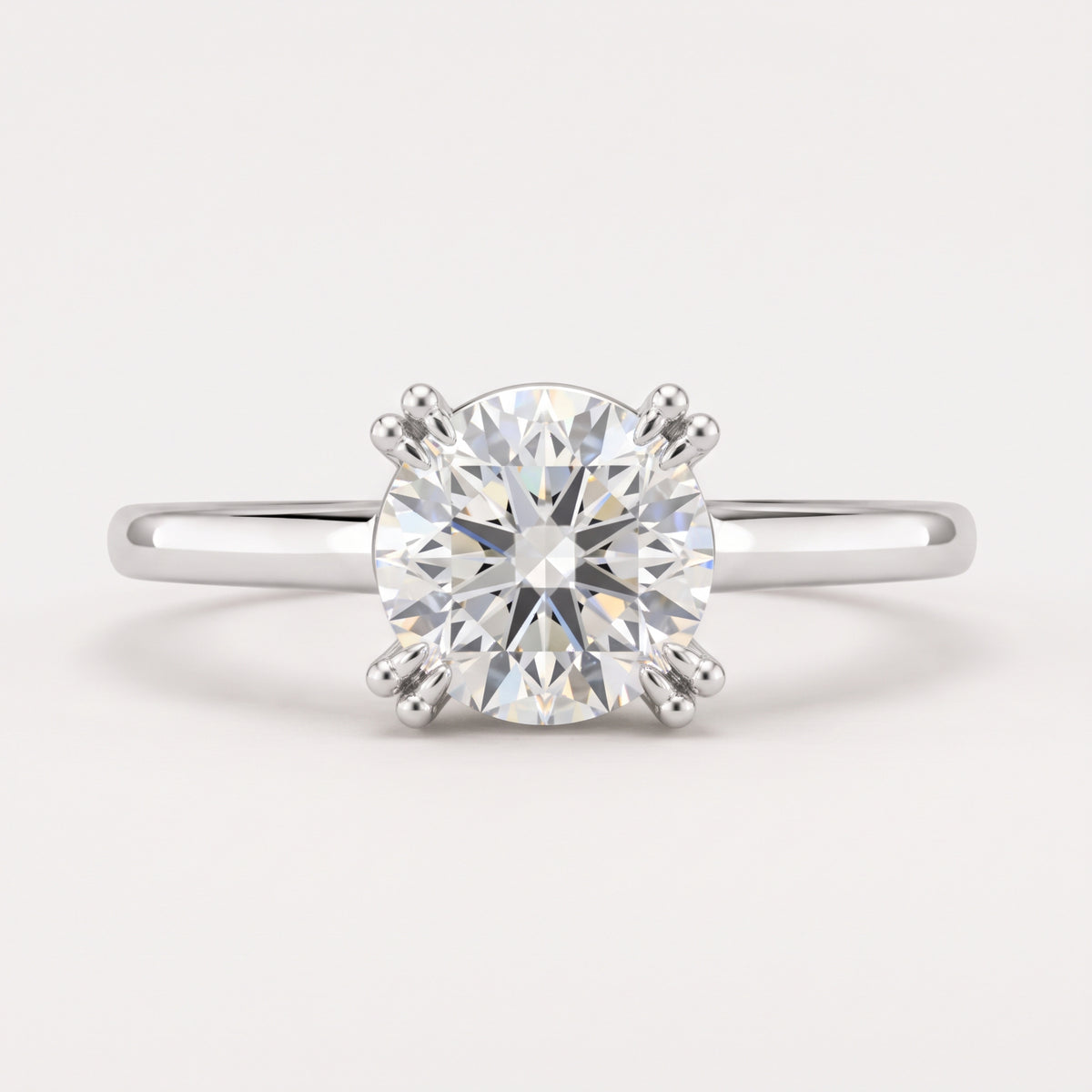 14K Round Solitaire — Double Prong Cathedral