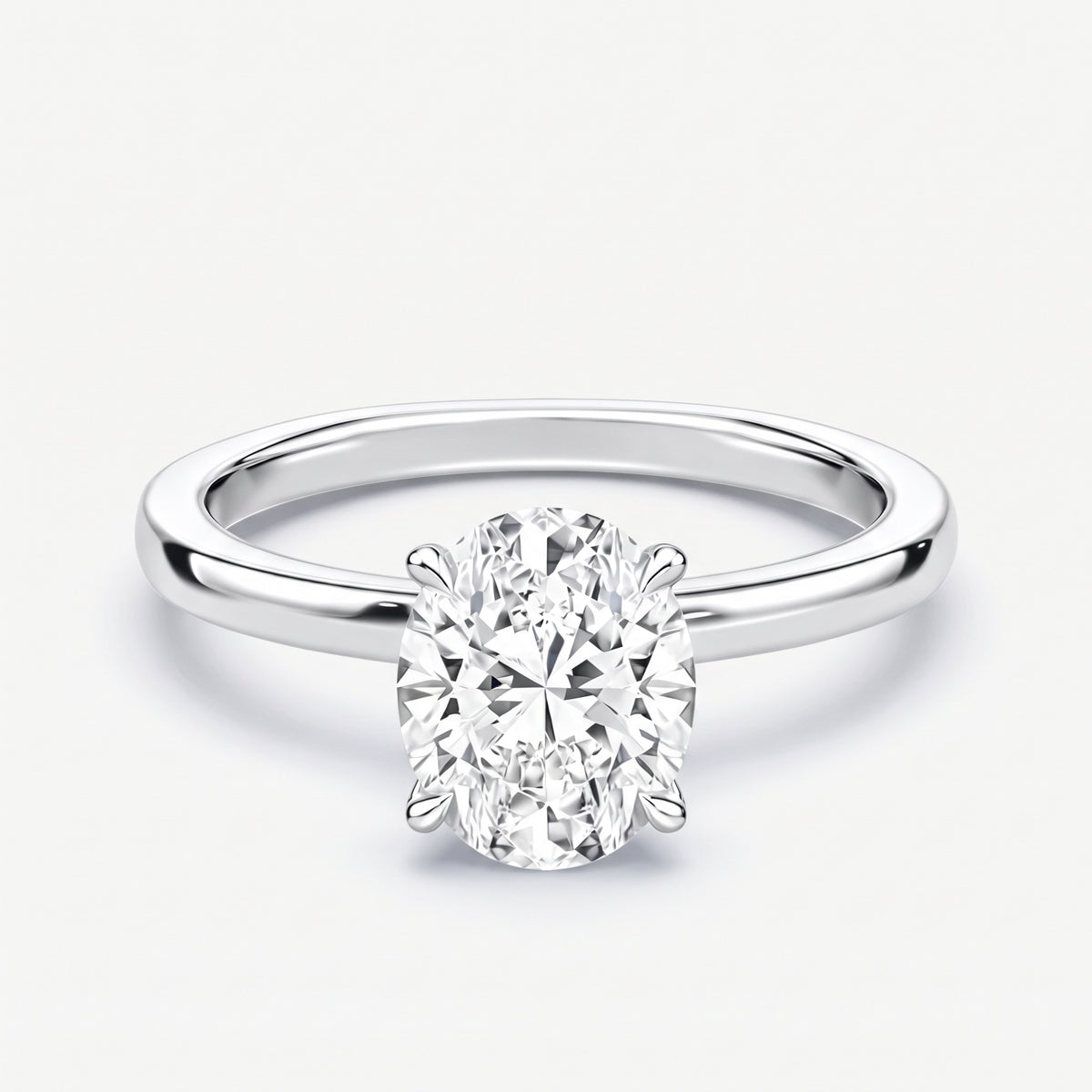 14K Oval Solitaire — Hidden Halo