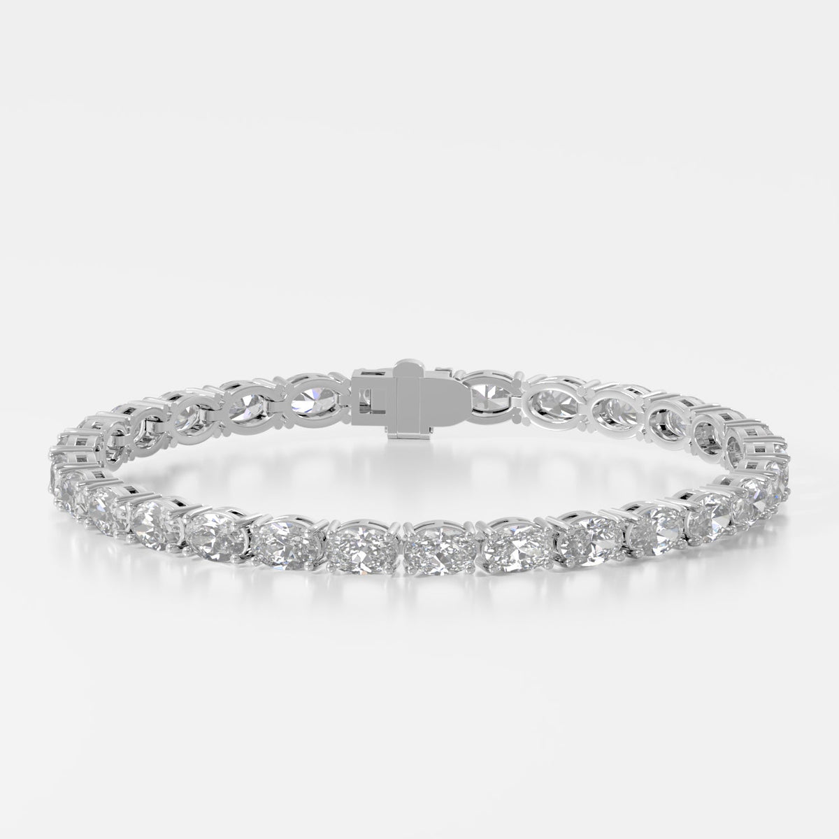 14K E/W Oval Tennis Bracelet