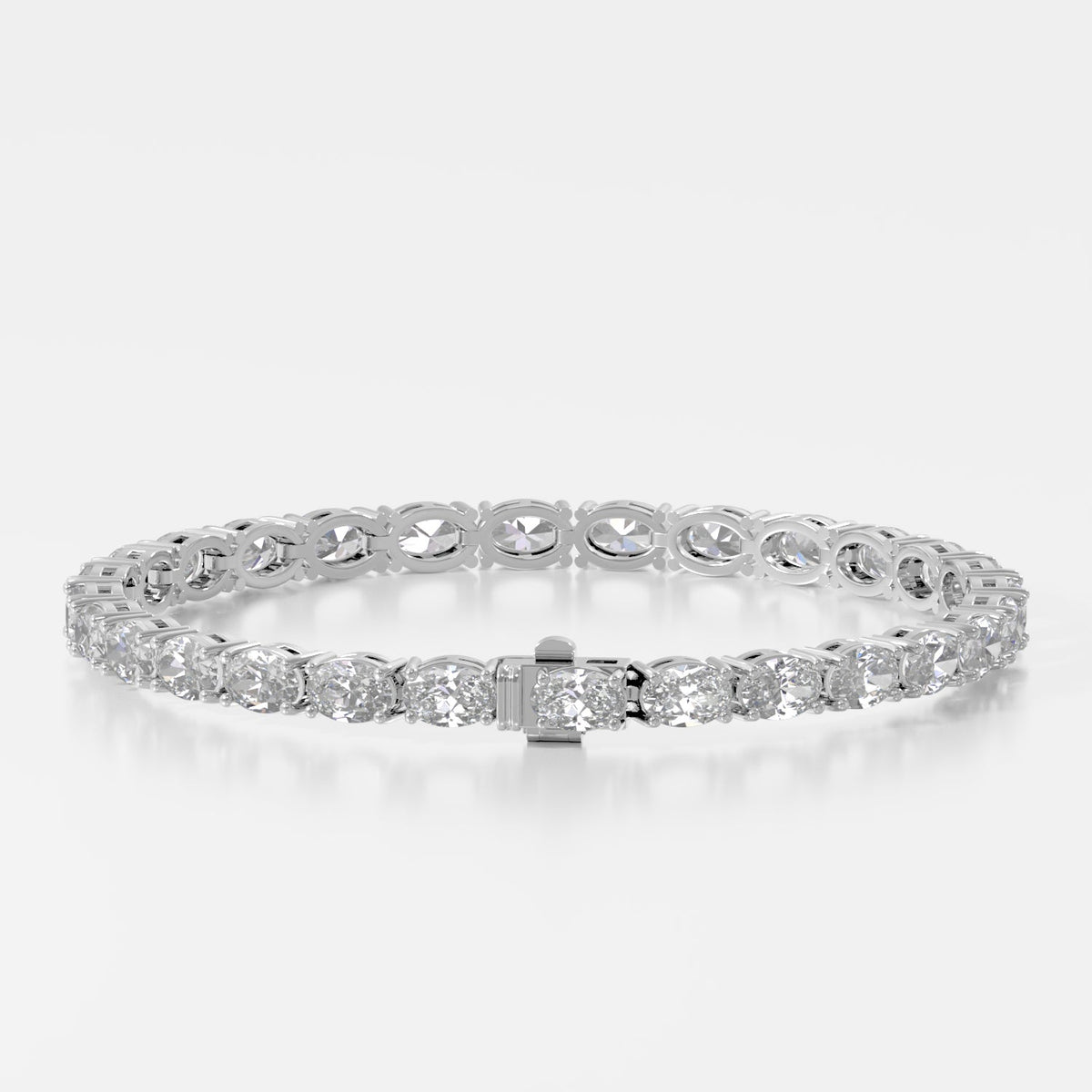 14K E/W Oval Tennis Bracelet