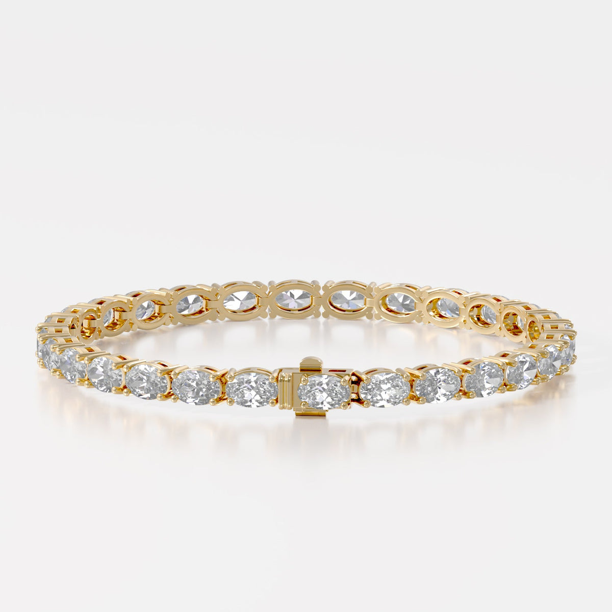 14K E/W Oval Tennis Bracelet