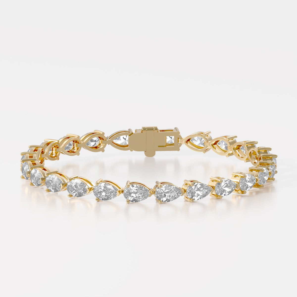 14K E/W Pear Tennis Bracelet