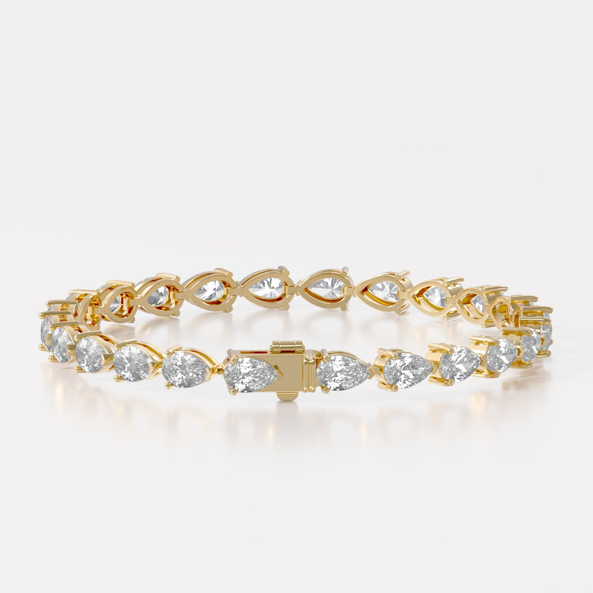 14K E/W Pear Tennis Bracelet