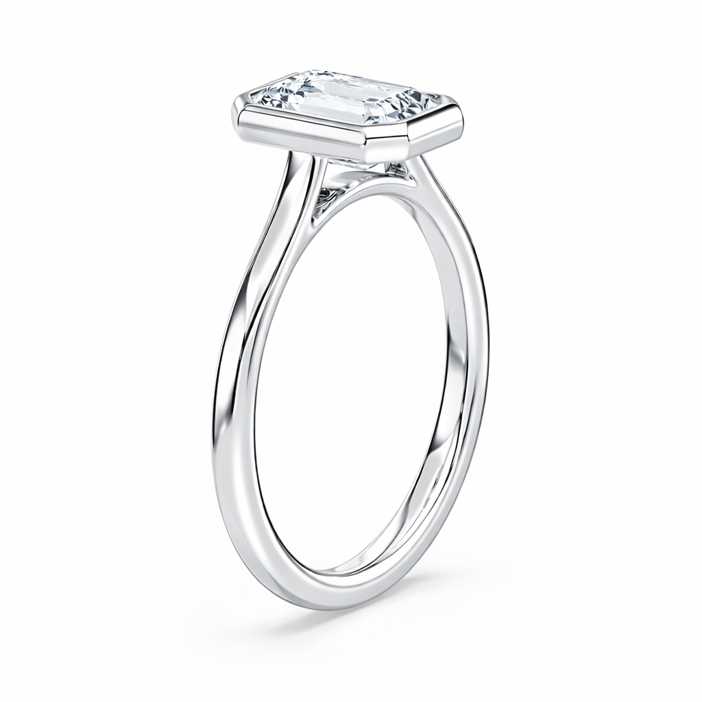 14K Emerald Solitaire — Bezel Set