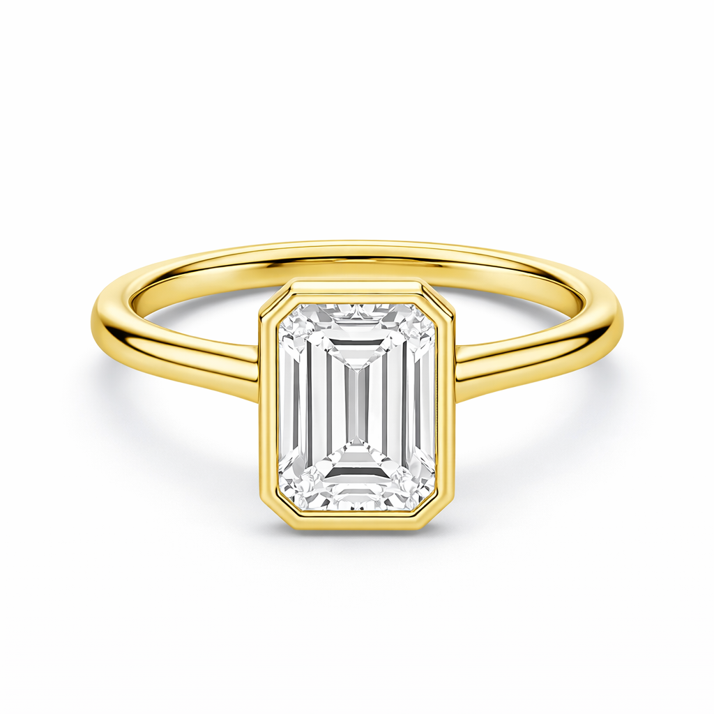 14K Emerald Solitaire — Bezel Set