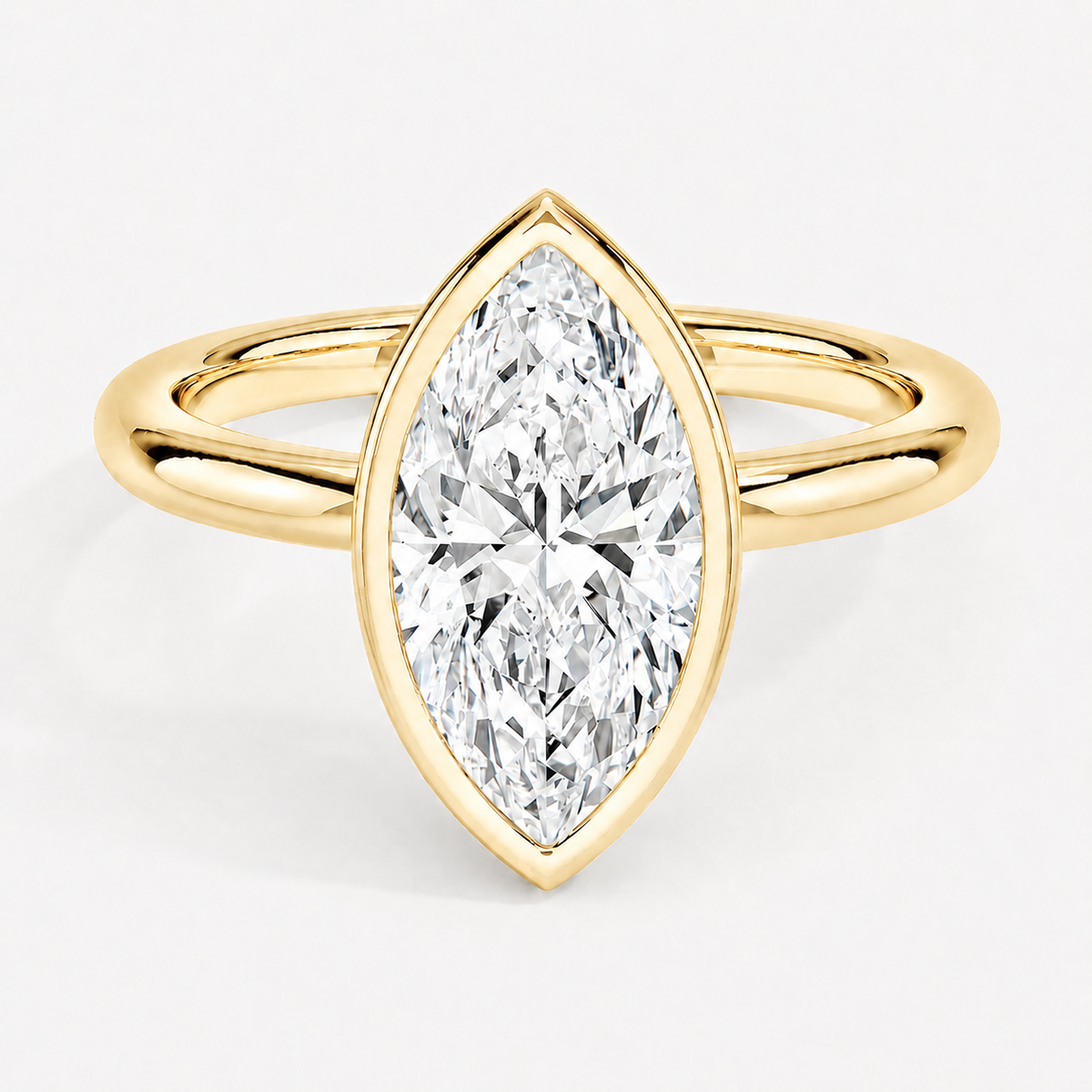14K Marquise Solitaire — Bezel Set